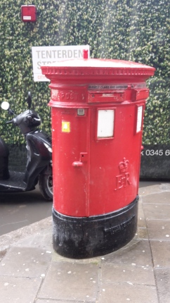 Red Figure on the red post box